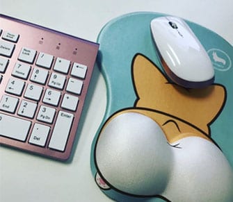 korgi mousepad and pink keyboard